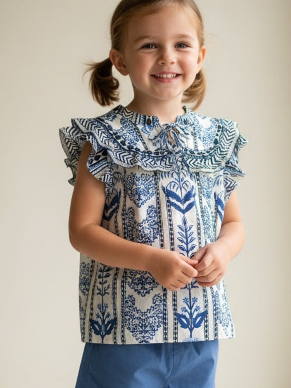 3 for $36 Girls Blue Floral Ruffle Top